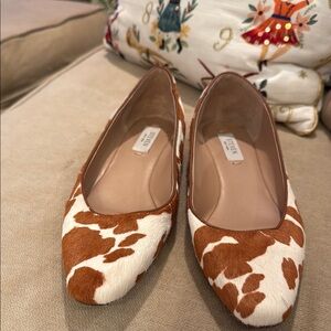 Elegant Cow Print Flats in Brown and White